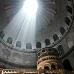 A stunning view of sunlight streaming through a cathedral dome, highlighting architectural beauty.