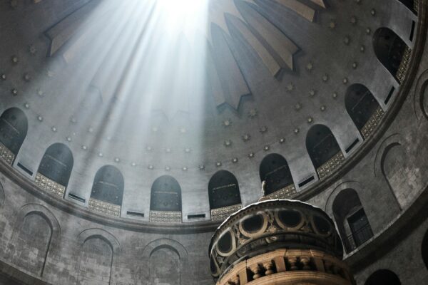 A stunning view of sunlight streaming through a cathedral dome, highlighting architectural beauty.