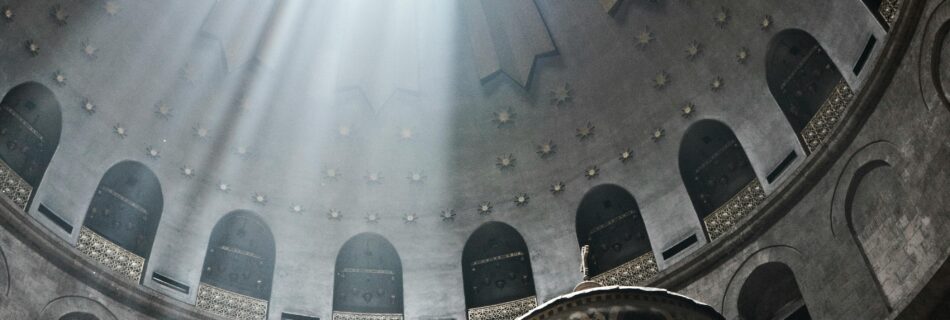 A stunning view of sunlight streaming through a cathedral dome, highlighting architectural beauty.