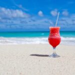 drink, cocktail, beach, beverage, refreshment, alcoholic drink, alcoholic beverage, glass, coast, sand, shore, seashore, paradise, tropical, nature, caribbean sea, caribbean